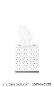 Patterned Grey And White Front View Of A Tissue Box With White Tissue Out On A White Background With Reflection On The Bottom