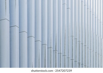 Patterned vertical stripes, columns structure of modern design building wall abstract details