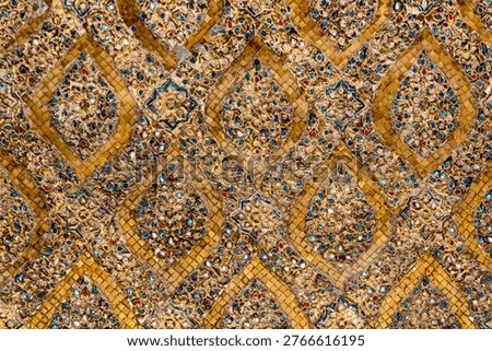 Patterned walls, frames, and roof edges create a rich study of Thai temple design. Repeated motifs and colors fill each close architectural view.