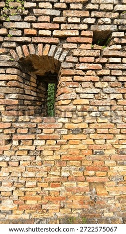 patterns image of ancient brick cobblestone texture.
