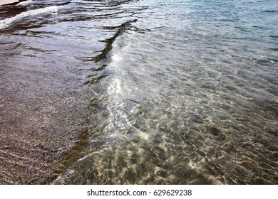 Patterns on the sand made by receding waves of the Andaman Sea