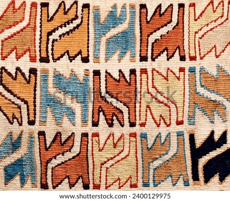 Patterns on traditional rug hand-woven by Turkmen nomads of the Eastern Mediterranean region