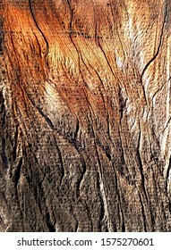 Patterns In A Plank Of Wood In An Old Outdoor Redwood Fence 