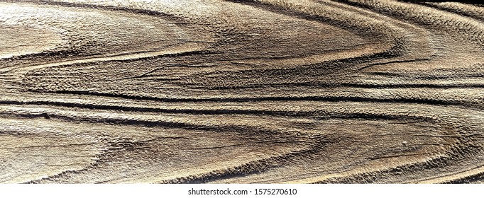 Patterns In A Plank Of Wood In An Old Outdoor Redwood Fence 