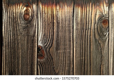 Patterns In A Plank Of Wood In An Old Outdoor Redwood Fence 