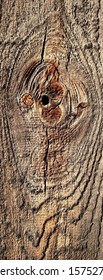 Patterns In A Plank Of Wood In An Old Outdoor Redwood Fence 