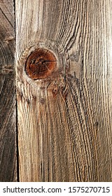 Patterns In A Plank Of Wood In An Old Outdoor Redwood Fence 