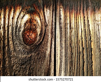 Patterns In A Plank Of Wood In An Old Outdoor Redwood Fence 