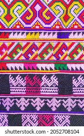 Patterns of traditional woven fabric in the Northern of Thailand. Ancient fabric colorful thai handcraft.