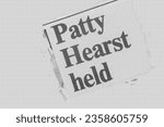 Patty Hearst held - news story from 1975 UK newspaper headline article title pencil sketch