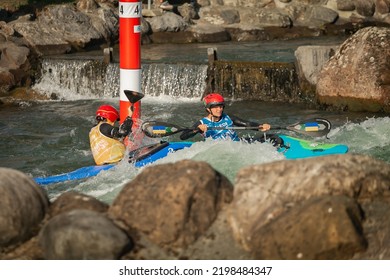 PAU, FRANCE - AUGUST 27, 2022: Extreme Kayak Slalom Racers