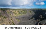 Pauahi Crater in Hawaii Volcanoes National Park with a very small rainbow