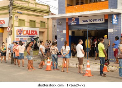 Paudalho, Pernambuco/Brazil - April 27 2020: Queue Of People In Front Of The Caixa Econômica Bank Waiting For The Emergency Aid That The Government Gave Due To The Covid 19 (coronavirus) Pandemic