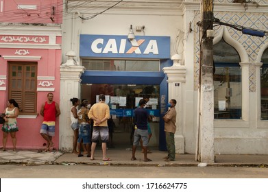 Paudalho, Pernambuco/Brazil - April 27 2020: Queue Of People In Front Of The Caixa Econômica Bank Waiting For The Emergency Aid That The Government Gave Due To The Covid 19 (coronavirus) Pandemic