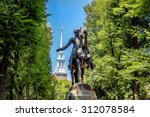 Paul Revere Statue and Old North Church in Boston, Massachusetts with blue sky