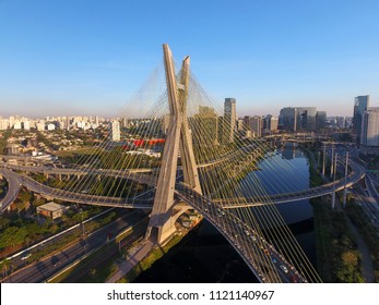 São Paulo, São Paulo / Brazil - 06/23/2018: Aerial view of the Octavio Frias de Oliveira Bridge - the cable-stayed bridge is a landmark of São Paulo, Marginal Pinheiros Avenue, Pinheiros River