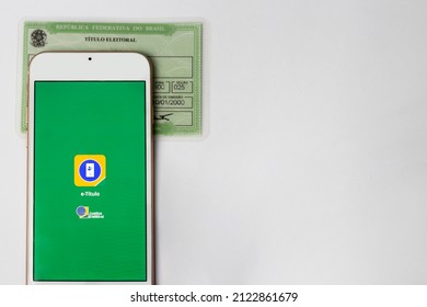 São Paulo, Brazil. February 10, 2022. Voter Registration Card And Brazilian Government App On Cellphone (e-titulo).