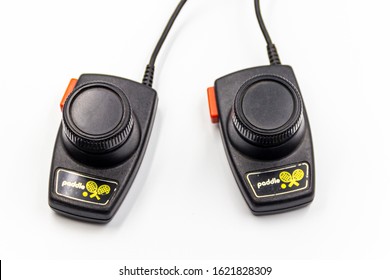 São Paulo, Brazil- January 19, 2020:  A Studio Shot Of A Atari 2600 Pong Paddle Controllers Isolated On A White Background.