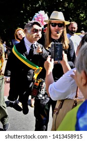 São Paulo, Brazil, May, 26, 2019: The Ventriloquism With The Doll Jairzinho Bolsonaro Rejoicing In The Paulista Avenue In The Manifestation Pro Reform