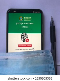 São Paulo, Brazil. November 9, 2020. Detail Of Digital Eleitoral Title (voter Registration) Mask And Pen, Mandatory Items In Brazilian Elections.