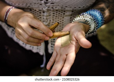 Paulo, SP, Brazil - November 23 2021: Hands of caucasian women holding kuripe and snuff
