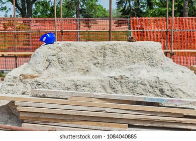 Pausing On The Construction Site And Leaving A Helmet For A Worker