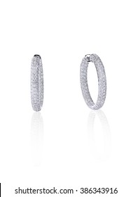 Pave Diamond Hoop Earrings Isolated On White With A Reflection