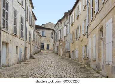 A Paved Alley Of Cognac, France