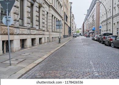 Paved Empty Cobblestone Street With Sidewalk And Curb In The City Of Hamburg