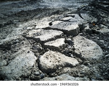 paved road is damaged, Low quality subbase material, heavy used roads