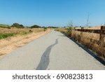 Paved trail through grassy fields, Mountain View, California