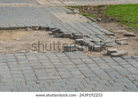 A pavement with paving stones, which was dismantled during the riots, protests and clashes with the police. Protestants threw them in the direction of the security forces.