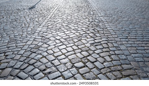 Pavement road. Background of bricks road. Stone cladding pavement. Brick surface background. Rough brick road. Cobblestone pavement background. Textured background. Sidewalk. Old cobblestone road. - Powered by Shutterstock