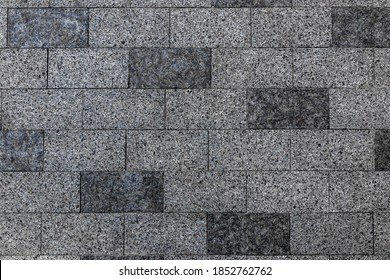 Pavement stone texture. Old brick floor pattern. Cobblestone sidewalk top view. Cobble rock street path. Square construction exterior closeup. Gray slab patio mosaic. Granite wall