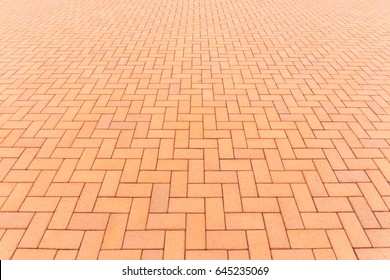 Paver Brick Floor Also Call Brick Paving, Paving Stone Or Block Paving.
Manufactured From Concrete Or Stone For Road, Path, Driveway And Patio. Empty Floor In Perspective View For Texture Background.