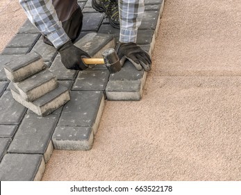 Paver Laying Driveway Pavement Out Of Concrete Pavement Blocks