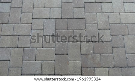 Pavers close up in a textured background pattern and various colors