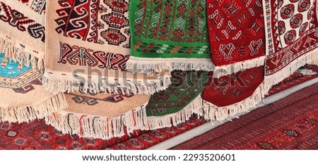 Pavilion selling Turkmen handmade carpets. Handmade carpets with traditional ornament. Turkmenistan. Ashkhabad market.
