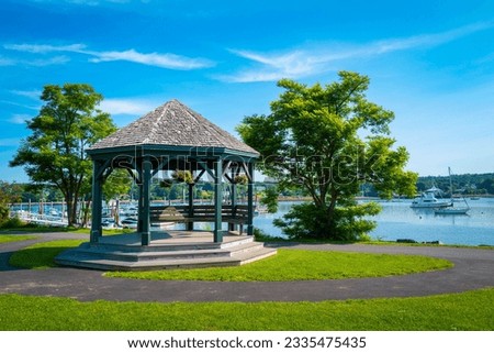 Pavillion on the Green of Steamboat Landing Park in Belfast. Tranquil summer landscape along the Passagassawakeag River in Waldo County, Maine.
