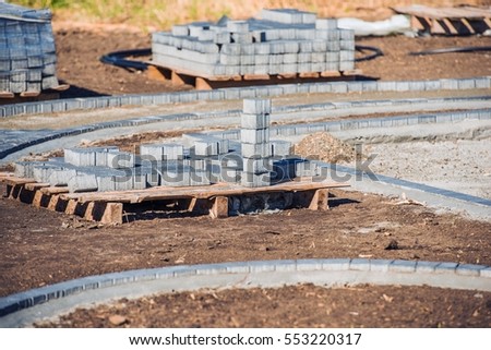 Paving Brick Paths. Pile of Bricks Ready For Paving. 