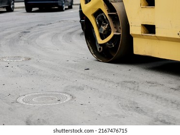 Paving Roller Machine During Road Work. Road Roller Working At Road Construction Site