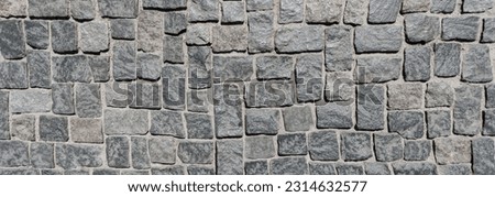 Paving stone pavement texture. Cobblestone pavement top view. Old stone sidewalk. Paving texture. Cobble stone road cobble texture. Cobblestone background. Old pavement background. Cobblestone road