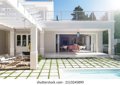 Paving Stones At Poolside Patio Of Luxury House