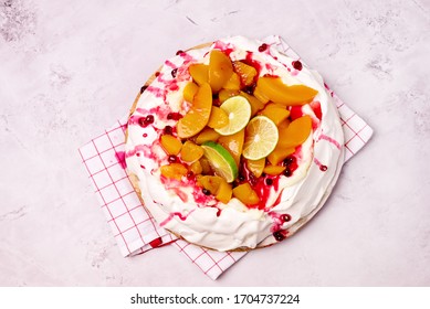 Pavlova Meringue Cake Decorated With Peach Berry Jam And Lime Tasty Homemade Dessert Top View