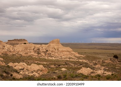 Pawnee Buttes Grassland in northeastern Colorado.  Arid and dry landscape. Desert landscape  with green brush.  Blue sky and white clouds.  - Shutterstock ID 2203910499