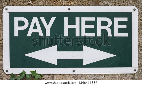 Pay Here
sign
