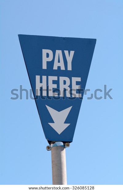 Pay Here sign in car\
park