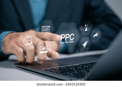 Pay per click PPC concept. Advertising in Search Engine Platforms. Digital Marketing Strategies and Goals. Businessman using laptop with PPC icon on virtual screen.