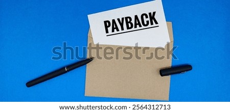 Payback Concept: Brown Envelope with Text and Pen on Blue Background. 