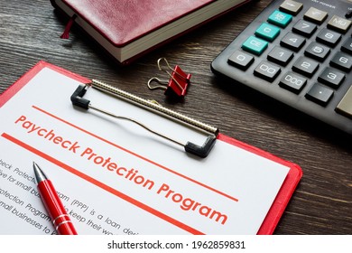 Paycheck Protection Program PPP Loan Application Form And Pen.